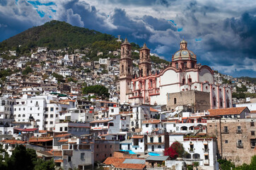 Fototapeta na wymiar Colonial Era Church and Hillside Townscape, Latin America