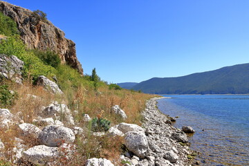 Fototapeta na wymiar View at maligrad island (albania) at lake prespa