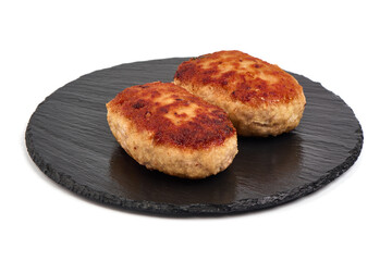 Homemade fried pork cutlets in breadcrumbs, meatballs from minced meat, isolated on white background.