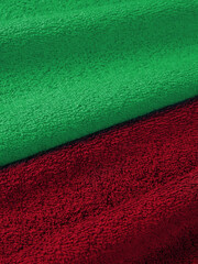 example of bath towel color. light green and carmine red. macro.​