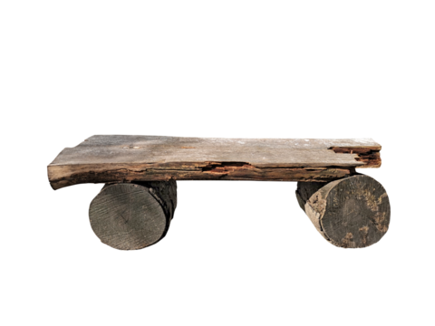 Ancient rural bench from logs. Isolated over white. Roughly hammered together wooden bench, transparent background