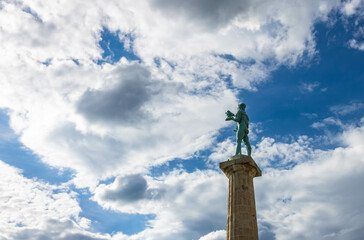 Fototapeta na wymiar Pobednik monument, the Victor, isolated, cloudy background, Belgrade, Serbia