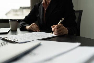 Signing contract, Closeup businessman signing business contract document. business agreement and deal concept