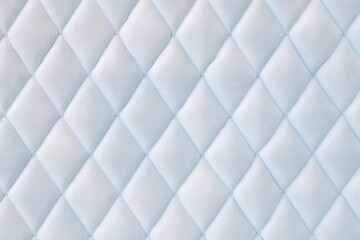 Seamless light pastel blue diamond tufted upholstery background texture