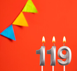 Birthday card - Number 119 candle in orange background