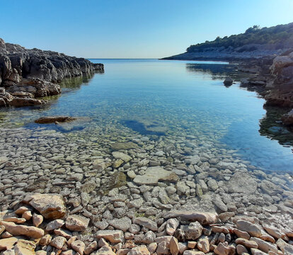 beautiful coast in Mali Lo&scaron;inj Croatia with crystal clear sea and visible horizon