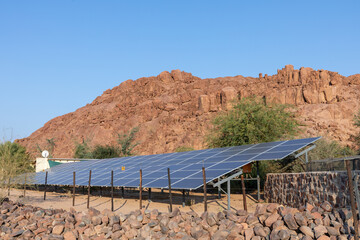 Solar panels provide power to a neaby resort in the rocky Damaraland area on the edge of the Namib desert in the Erongo district of northwestern Namibia.