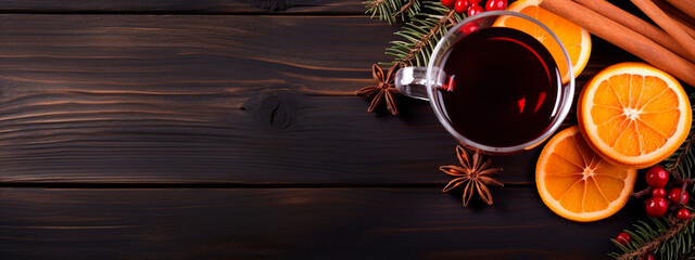 fresh delicious mulled wine on a wooden table.