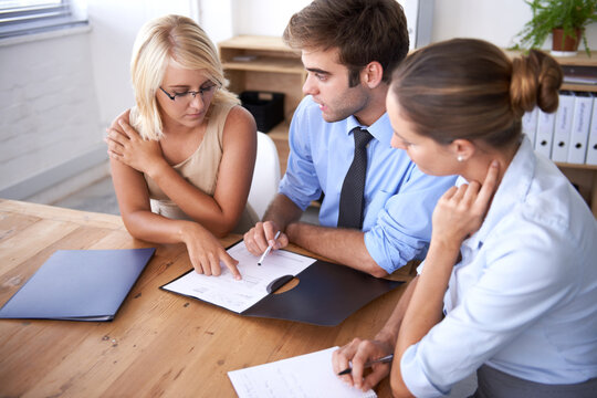 Documents, teamwork and professional people discussion on financial feedback, corporate project or strategy. Paperwork, folder and team review company finance numbers, business budget or sales report