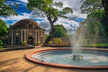 Serene Historical Site with Fountain, Bird, and Dome Building Amidst Modern City Skyline, Latin...
