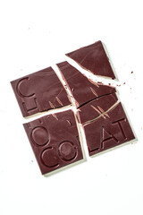 broken bar of chocolate with the inscription 