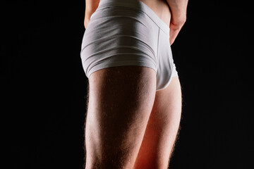 Male muscular legs body-building, muscle man in white sport panties