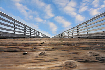 Wooden pier with a handrail on Pacific coast