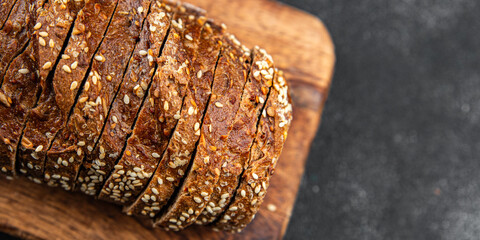 Rye bread sunflower seed slices fresh baked goods food healthy eating fresh cooking appetizer meal food snack on the table