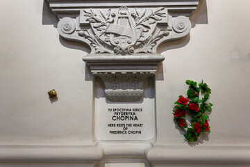 Warsaw, Poland. Funerary monument on a pillar in Holy Cross Church, enclosing Frederic Chopin's heart