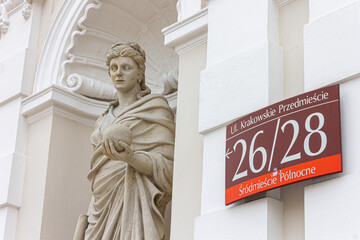 Warsaw, Poland. Statue of Urania, Greek muse of astronomy and astrology, at the entrance gate to the main campus of the University of Warsaw © J. Ossorio Castillo