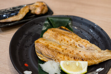 Grill fish on the dish in Japanese restaurant