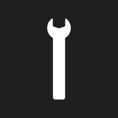 Wrench icon on black background.