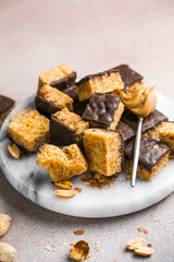 Various healthy granola bars (muesli or cereal bars). Set of energy, sport, breakfast and protein bars. Puffed rice, berries, chocolate, oatmeal, almond and honey cereal bars.
