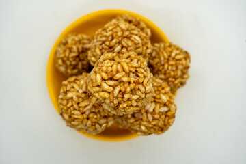 A plate of Murmura Murai Ladoo Puffed Rice in Jaggery Balls for Maghe Makar Sankranti Festival