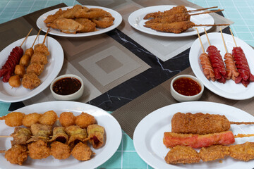 The empty space in the center is for illustrations with fried meatballs made from a variety of meats and sausages, mixed with flour and seasonings with delicious spicy sauce around the outside.