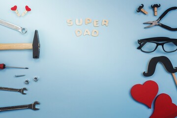 super dad inscription with tools glasses