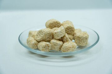 Sesame Ladoo aka til ko ladoo for Makar Maghe Sankranti  dipped in Jaggery for Hindu festival