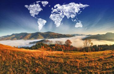 clouds in the form of a map of the world over the mountains. autumn dawn in the Carpathians. Travel and landscape concept  - obrazy, fototapety, plakaty