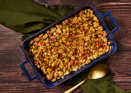 Pan of stuffing with serving spoon