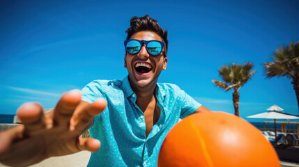 Playful man turquoise shirt orange background joyful photo