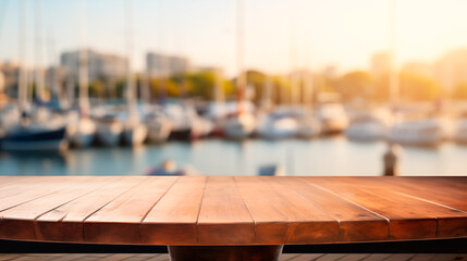 Empty wooden table in front blur yacht club background, product display - obrazy, fototapety, plakaty