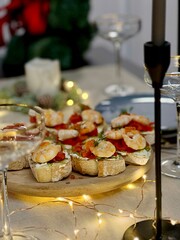 Festive candlelight dinner with shrimp and caviar sandwiches