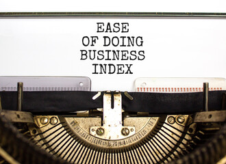 Ease of doing business index symbol. Concept words Ease of doing business index typed on old retro typewriter. Beautiful white background. Business, ease of doing business index concept. Copy space.