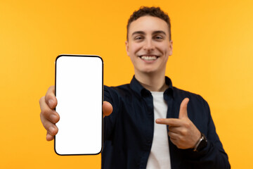 Phone with white blank screen in man hand