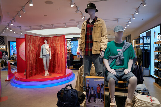 SINGAPORE - NOVEMBER 06, 2023: dressed mannequins inside Levi's store in Singapore. Levi Strauss and Co. is an American clothing company