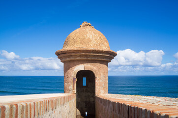 A cannon hole in Castillo San Felipe Del Morro or El Morro in old San Juan city, Puerto Rico. A...