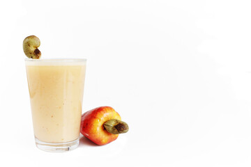 Cashew apple fruit, seed (nut) and juice on a white background 