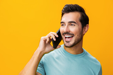 Man smiling phone copy mobile portrait space cyberspace phone smartphone communication yellow happy