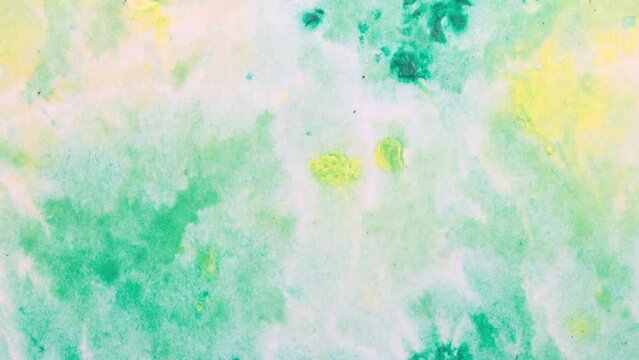 Stop motion animated water paint on paper texture background. Crumpled White Paper 4k