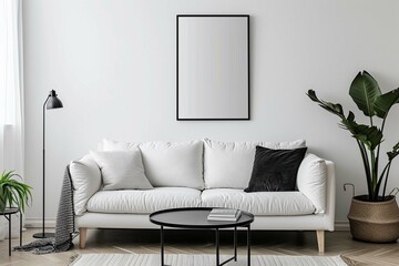 White sofa and black coffee table against white wall with art poster. Scandinavian boohoo home...