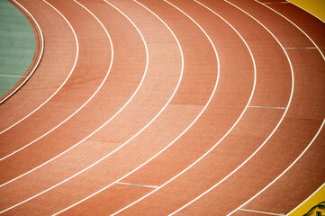Red athletics track, red lines, sport track and feld background