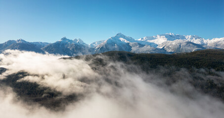 Fototapeta na wymiar Aerial View of Canadian Mountain Landscape. Sunny Winter Day.