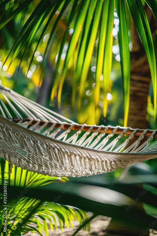 Poster a relaxing scene of a hammock hanging between two palm trees. perfect for travel and vacation themes