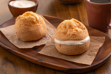 Brazilian snack. Pão de Queijo filled with requeijão (Brazilian creem cheese).	