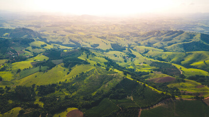 a panoramic view of Mountain range of Mantiqueira or Serra da Mantiqueira during sunset time -...