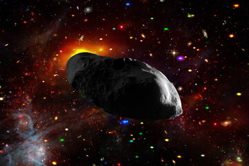 Asteroid flying in the deep space. Elements of this image furnished by NASA.