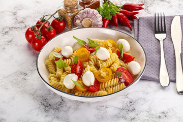 Italian pasta with mozzarella and tomato