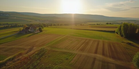 aerial drone footage of a rural countryside farm.