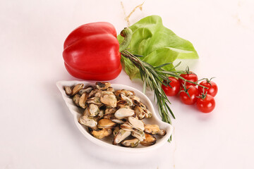 Marinated mussels in the bowl