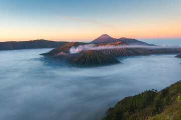 Mount Bromo in beautiful sunrise, with sea of cloud. An active volcano in Java, Indonesia